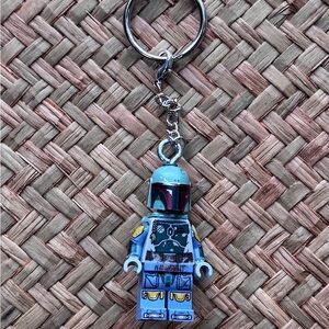 Blue and Gray Keychain with Figure